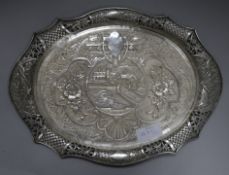 A Chinese embossed white metal tray, 42.4cm.