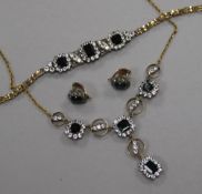 A mid 20th century yellow metal, blue and white sapphire set parure, comprising a necklace, bracelet