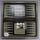 An Indian mother of pearl and bone chess/backgammon games box with horn and bone counters width 42cm