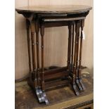 A nest of Edwardian oval mahogany tables W.60cm