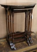 A nest of Edwardian oval mahogany tables W.60cm