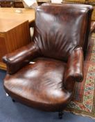 A pair Napoleon III oversized leather armchairs