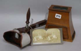 Two stereo viewers and a collection of stereo cards