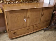 An Ercol style sideboard W.130cm