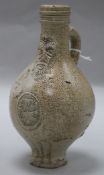 A 17th century German stoneware Bellarmine height 22cm