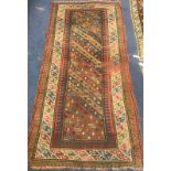 A Kelim red ground rug 225 x 107cm