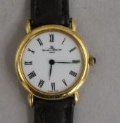 A lady's 18ct gold Baume and Mercier quartz wrist watch.