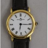 A lady's 18ct gold Baume and Mercier quartz wrist watch.