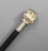 A Japanese ivory walking stick handle, early 20th century, carved as a kappa's head, the scalp