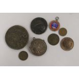 A Victoria one penny 1879, AUNC and a collection of bronze medals, coins and tokens, including a