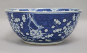 A Chinese blue and white 'prunus' bowl, 19th century, diameter 30.5cm