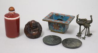 A bag of small items: Chinese cloisonne incense burner, two bronze mirrors, a porcelain snuff