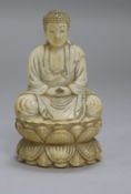 A Japanese ivory figure of a Buddha