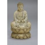 A Japanese ivory figure of a Buddha