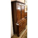 A George III mahogany press cupboard W.102cm