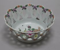 A Worcester polychrome basket, c.1770, the interior painted with a bouquet of flowers and the