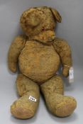 An early 20th century teddy bear