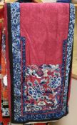 A Chinese maroon silk with blue embroidery skirt
