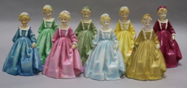 Eight Royal Worcester figures of 'Grandmother's Dress', after Freda Doughty, various colours