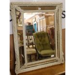 A painted frame cushion mirror W.85cm