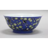 A Chinese blue ground prunus and blackbird bowl, bearing Qianlong mark to the base, diameter 14cm