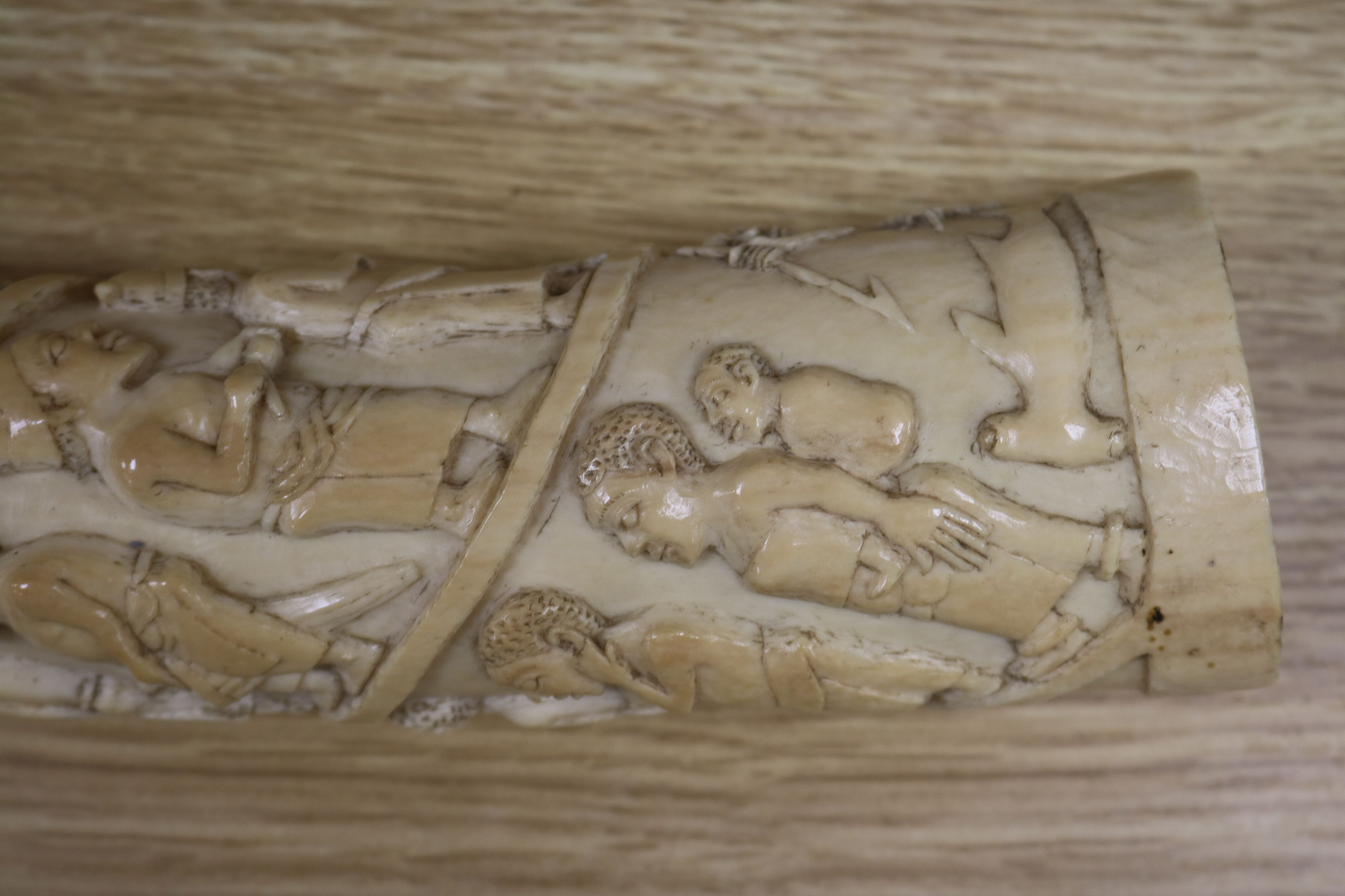 A Belgian Congo ivory oliphant, c.1900, carved with a procession of figures, hammerhead shark - Image 2 of 9