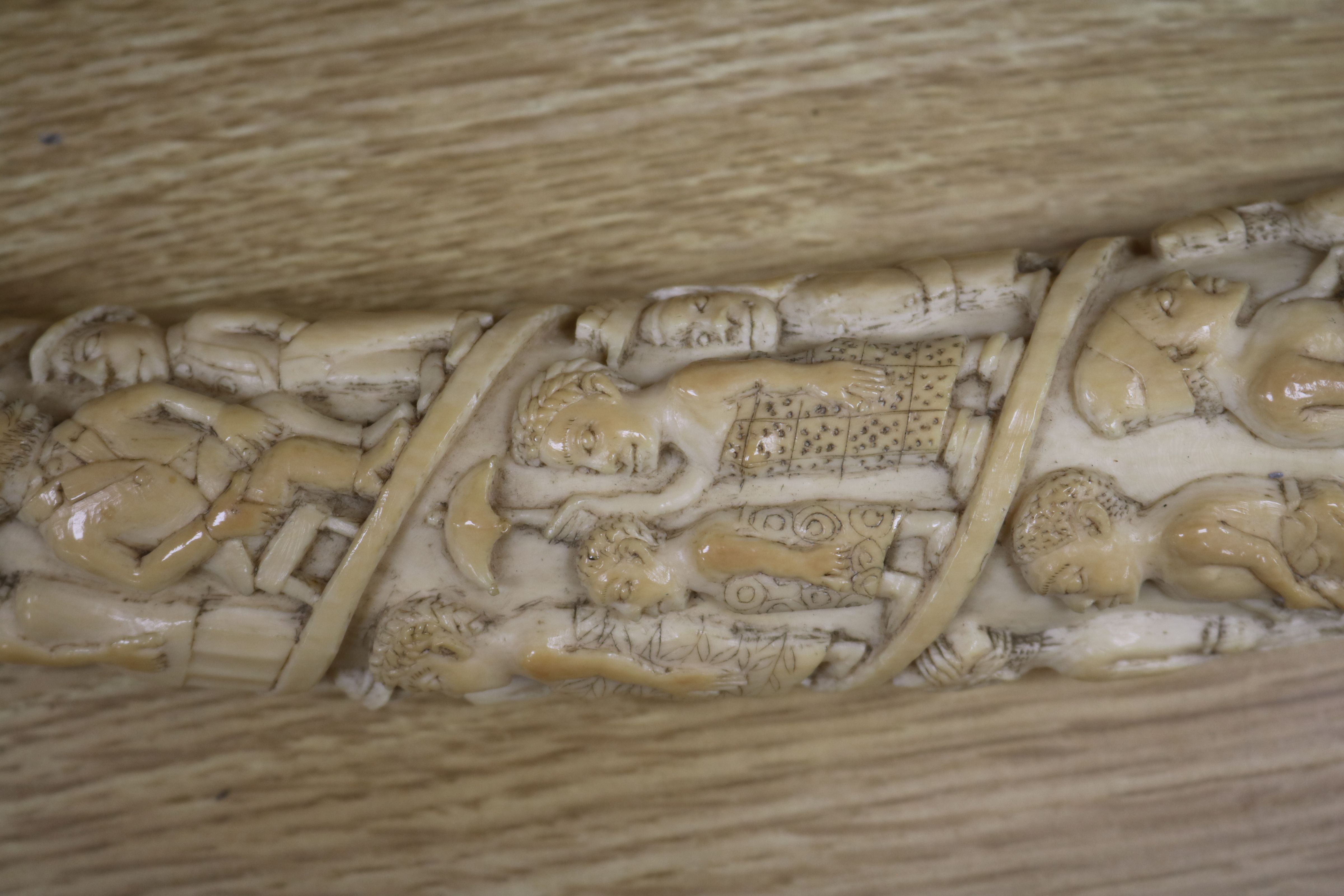 A Belgian Congo ivory oliphant, c.1900, carved with a procession of figures, hammerhead shark - Image 3 of 9