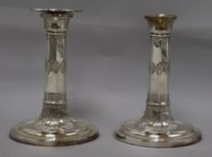 A pair of George III style plated candlesticks height 16cm