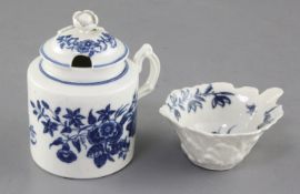 A Worcester Mansfield pattern butter boat, c.1760 and a Worcester floral pattern mustard pot and