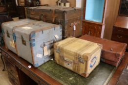 Two travelling trunks and two suitcases