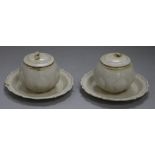 A pair of bowls, covers and stands, ding