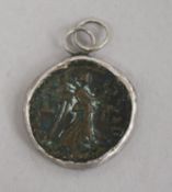 A Roman bronze coin, possibly Maximianus, in white metal pendant mount with suspension loop, Dia