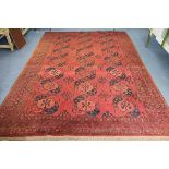 A Bokhara red ground carpet 310 x 230cm approx.