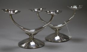 A pair of German 835 white metal pricket candelabra, height 12cm.