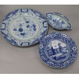 An 18th century Chinese blue and white dish and sauceboat, and three Staffordshire pottery printed