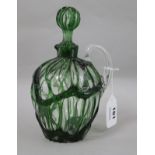 A Stevens & Williams clear and green cagework glass jug and stopper, registered design number for
