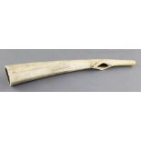 An antique West African ivory oliphant, with dot decorated mouthpiece, 39cm