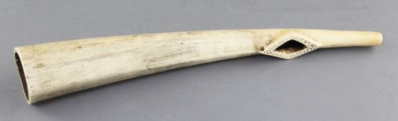 An antique West African ivory oliphant, with dot decorated mouthpiece, 39cm