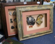 A framed display containing a Paleolithic Henley Pit chopper core and Moortown Pit handaxe and two
