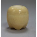 A Japanese ivory model of a fruit, with screw top