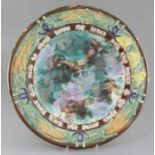 A Victorian majolica bread dish, late 19th century, with a motto, wheatsheaf and sickle border,