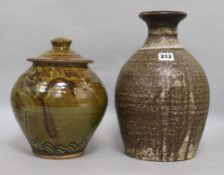 A Michael Leach Yelland Pottery vase and a Clive Bowen Studio Pottery jar and cover, the former of