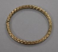 A 9ct gold 'ropetwist' bangle.