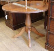 A pair of elm and ash stick back Windsor chairs and an oak circular topped table W.99cm