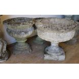 A campana urn shaped planter and two other planters W.46cm, 40cm and 35cm