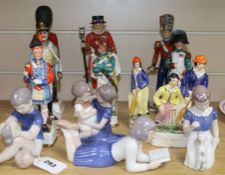 A collection of ceramic figures, various, including four Bing & Grondahl figures of children, two