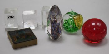 A box of eight coloured glass lantern slides, five various glass paperweights and a Stuart