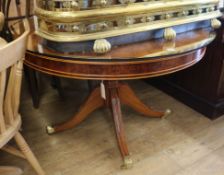 A modern yew breakfast table, with substantial circular plate glass top