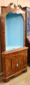 A walnut corner cupboard W.92cm (a.f.)