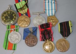 A quantity of French medals and a Service watch